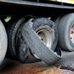 tire blowout when passing semi trucks-min