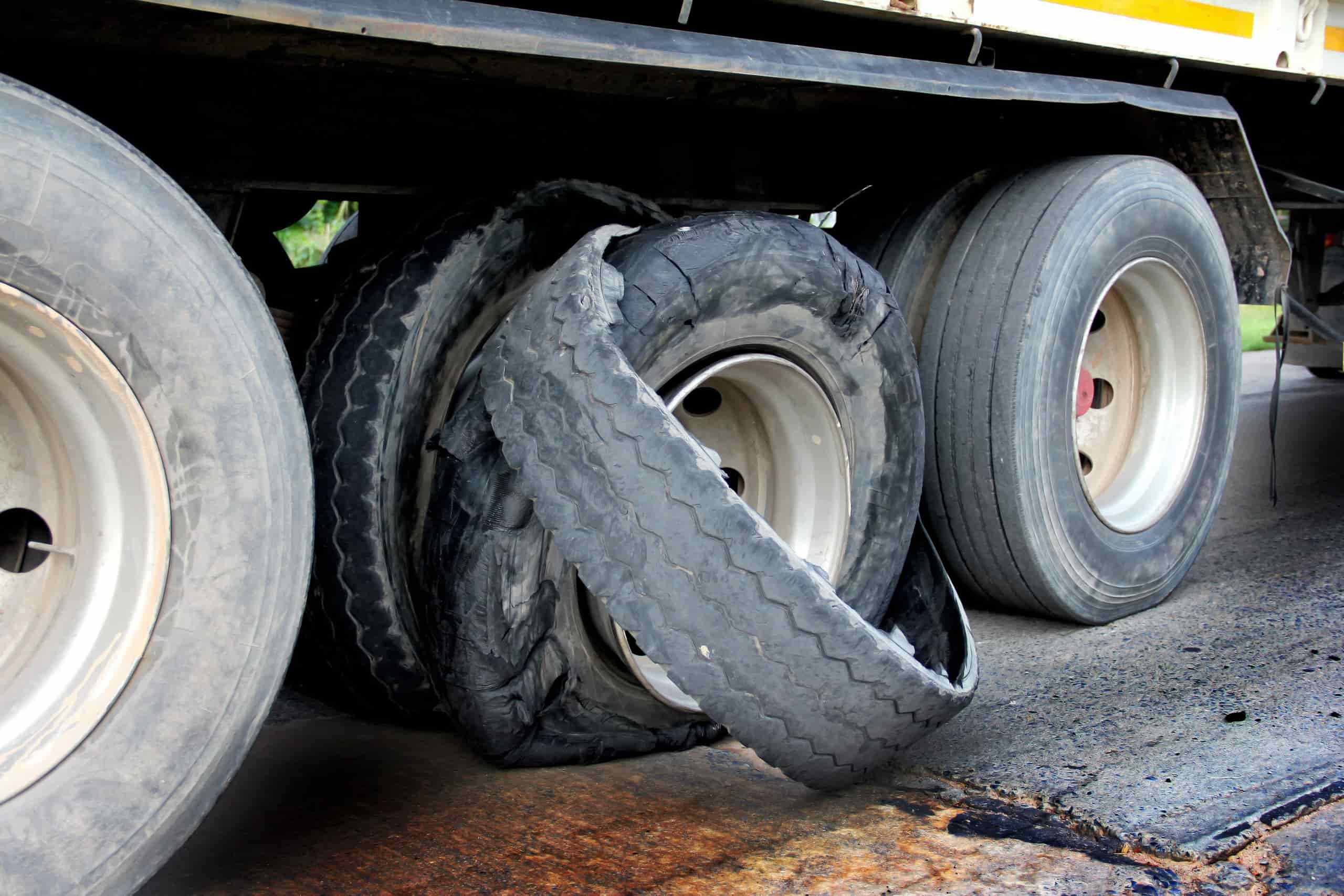 tire blowout when passing semi trucks-min